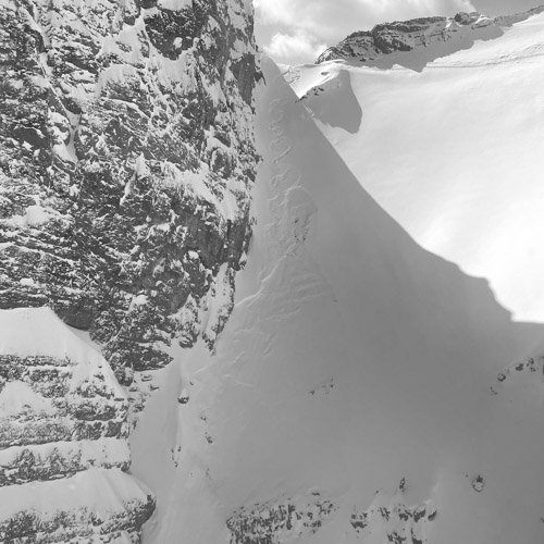Miners Gully Canmore, Extreme Terrain (note avalanche and tracks visible)